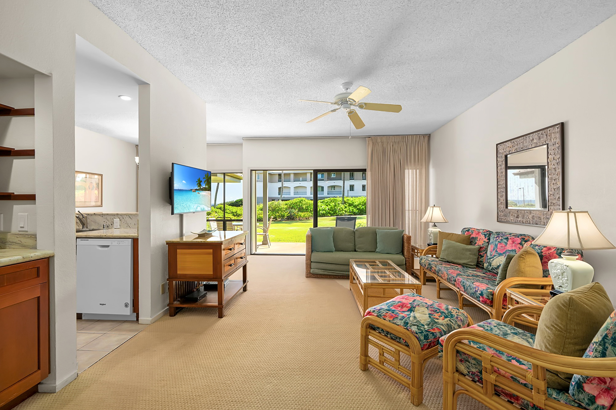 1565 Pe'e Road, Unit 418 Koloa, HI 96756 - Photo 7 of 30 a living room with furniture and a floor to ceiling window