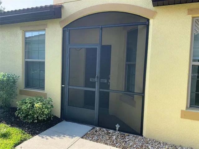 a wooden door in front of a door