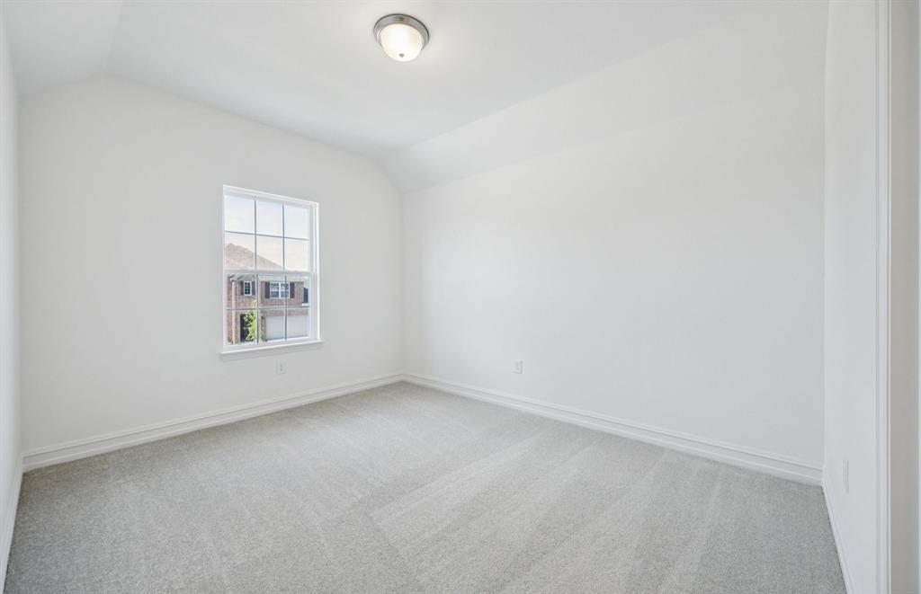 1713 Grace Street Anna, TX 75409 - Photo 17 of 22 Inviting bedroom offering soft natural light