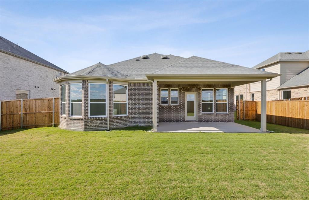 1713 Grace Street Anna, TX 75409 - Photo 22 of 22 Large covered patio offers ample space for entertaining or relaxing