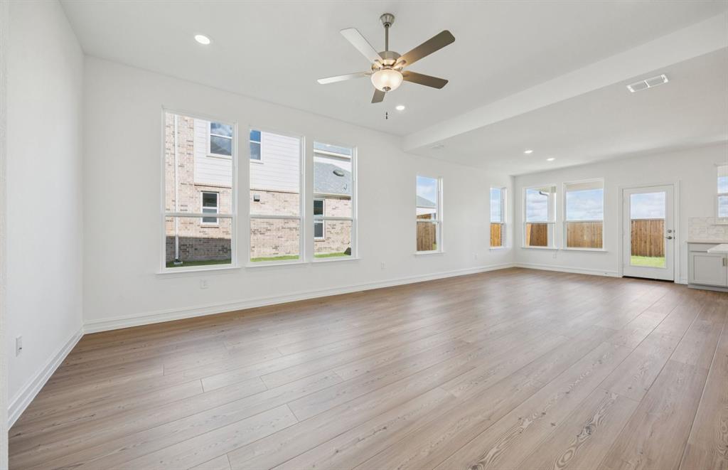 1713 Grace Street Anna, TX 75409 - Photo 6 of 22 Bright and inviting gathering room perfect for entertaining