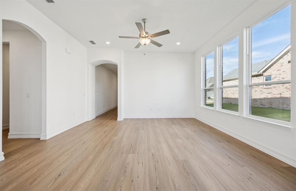 1713 Grace Street Anna, TX 75409 - Photo 7 of 22 Sunlit gathering room