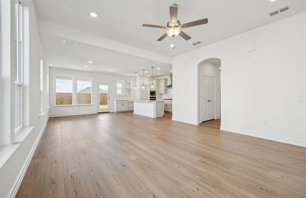 1713 Grace Street Anna, TX 75409 - Photo 8 of 22 Gathering room with direct access to the backyard