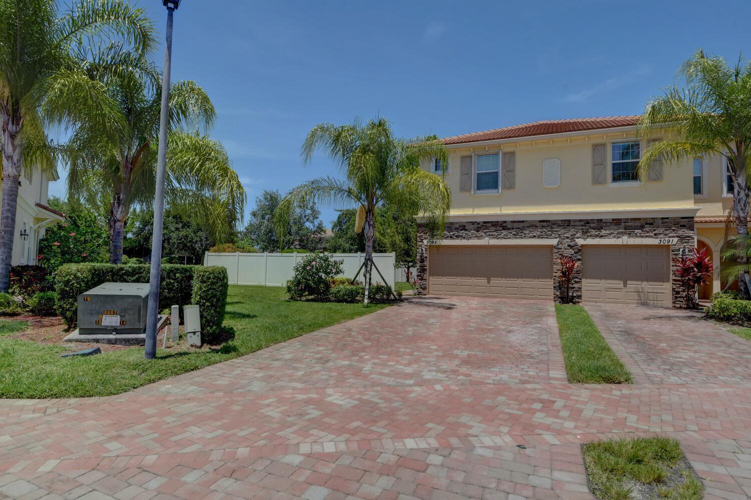 3095 Southwest Otter Lane Stuart, FL 34997 - Photo 2 of 43 Paver driveway