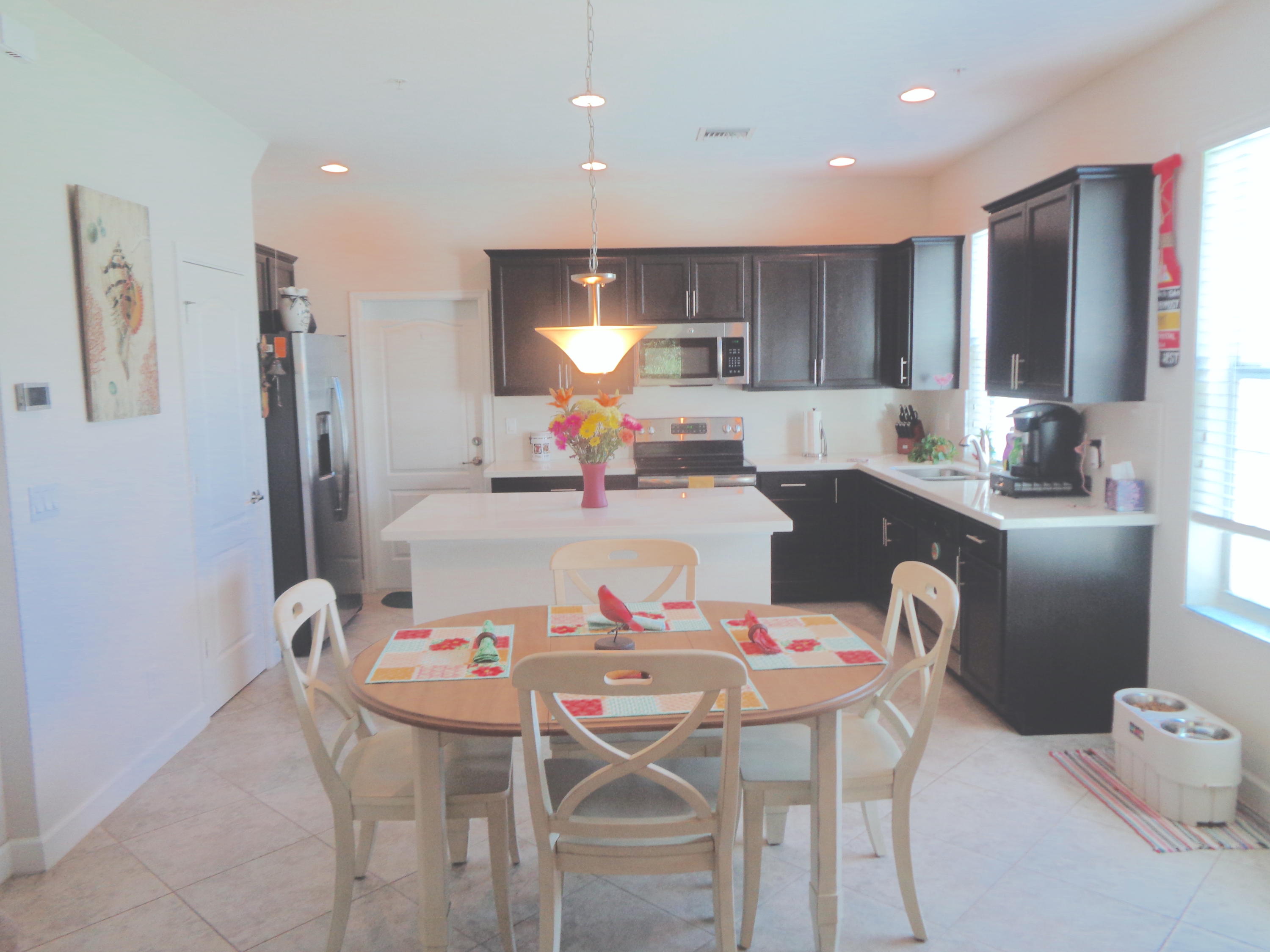 3095 Southwest Otter Lane Stuart, FL 34997 - Photo 10 of 43 Kitchen & dining