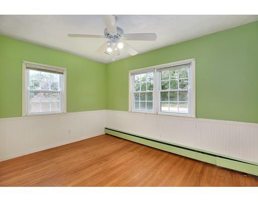 65 Barnett Road Sutton, MA 01590 - Photo 11 of 23 a view of an empty room with wooden floor and a window