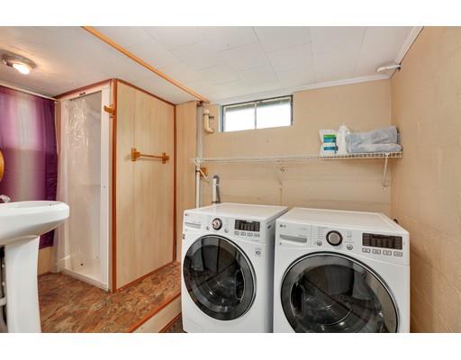 65 Barnett Road Sutton, MA 01590 - Photo 5 of 23 a view of utility room with washer and dryer