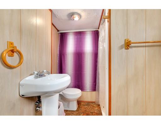 65 Barnett Road Sutton, MA 01590 - Photo 6 of 23 a bathroom with a sink toilet and a mirror