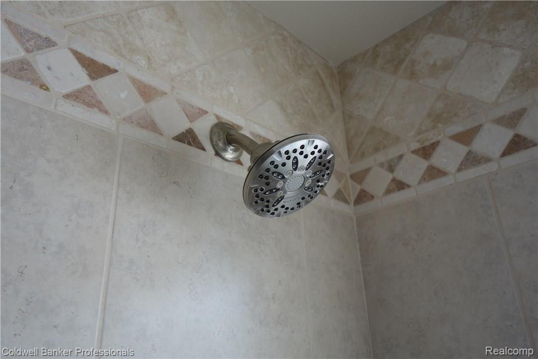 8870 Perry Lake Road Clarkston, MI 48348 - Photo 19 of 44 Shower in 2nd bathroom upstairs.