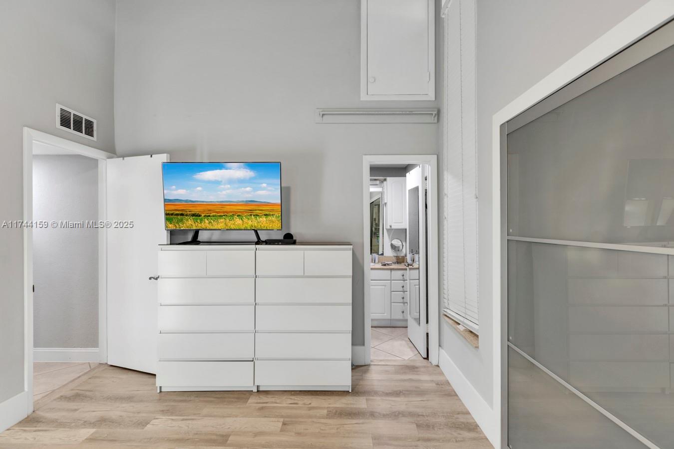 1161 Northwest 13th Street, Unit 4 Boca Raton, FL 33486 - Photo 15 of 39 a view of walk in closet