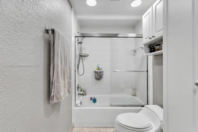 an aerial view of a house with outdoor space and street view