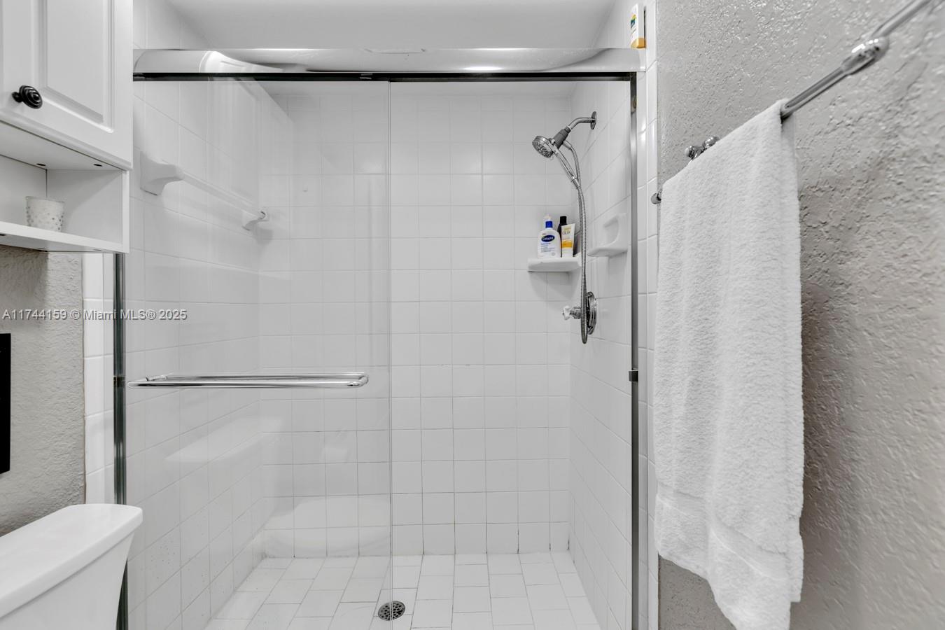 1161 Northwest 13th Street, Unit 4 Boca Raton, FL 33486 - Photo 21 of 39 a bathroom with a shower