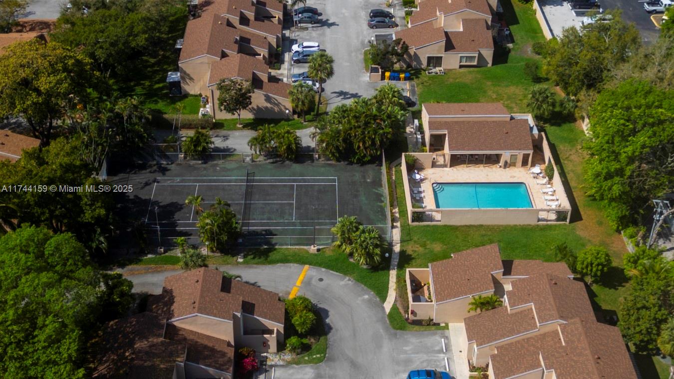1161 Northwest 13th Street, Unit 4 Boca Raton, FL 33486 - Photo 26 of 39 an aerial view of a house with outdoor space and street view