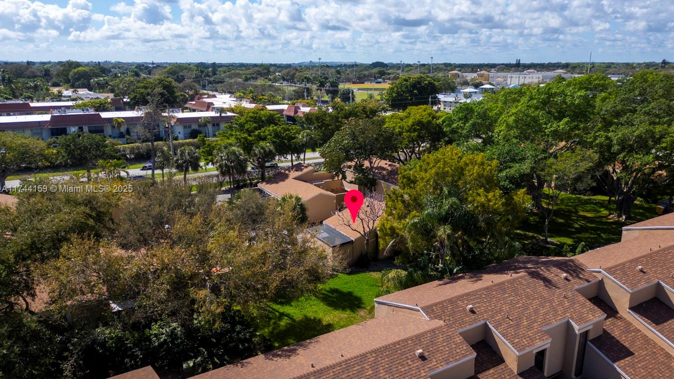 1161 Northwest 13th Street, Unit 4 Boca Raton, FL 33486 - Photo 37 of 39 an aerial view of a houses with yard