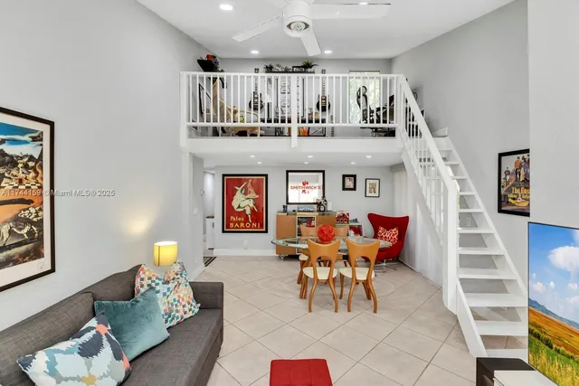 a view of a house with a potted plant