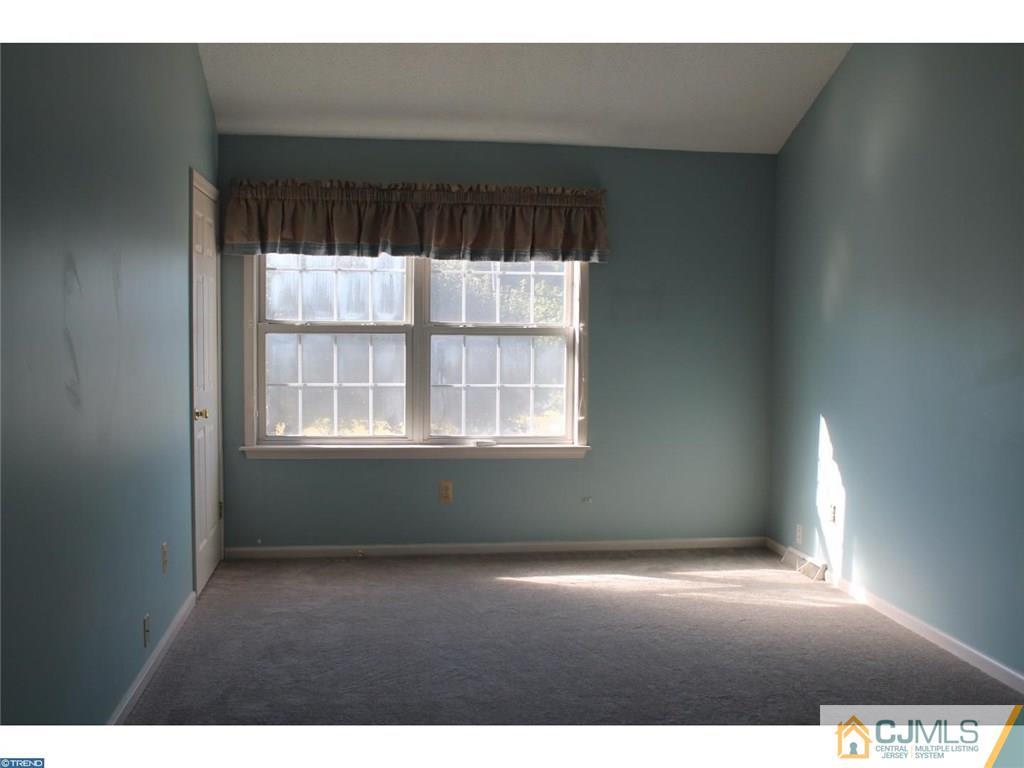 460 Flock Road Hamilton, NJ 08619 - Photo 14 of 25 a view of an empty room with a window