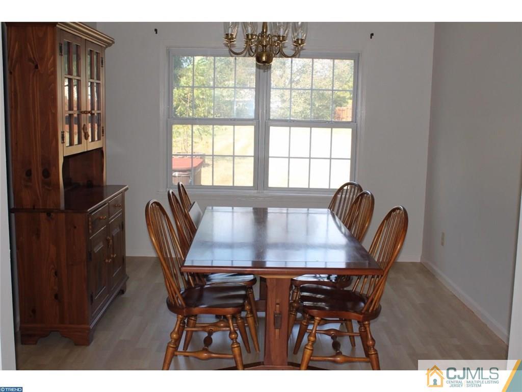 460 Flock Road Hamilton, NJ 08619 - Photo 20 of 25 a view of a a dining room with furniture window and wooden floor