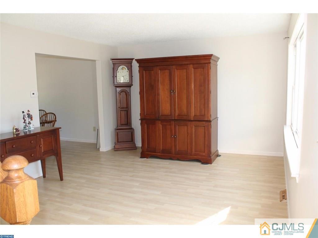 460 Flock Road Hamilton, NJ 08619 - Photo 10 of 25 a view of a storage & utility room with wooden floor