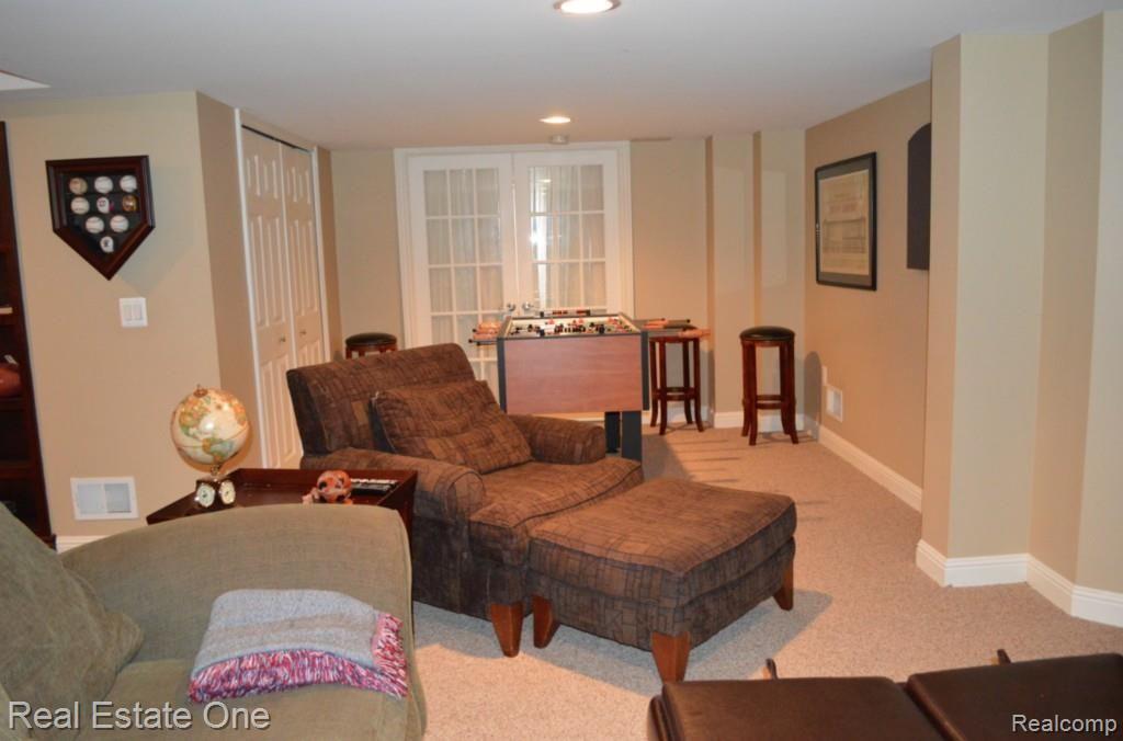 48005 Gladstone Road Canton, MI 48188 - Photo 36 of 62 Basement gaming area
