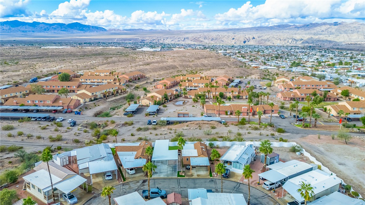 2000 Ramar Road, Unit 126 Bullhead City, AZ 86442 - Photo 38 of 65 Aerial view of residential area with a mountain backdrop