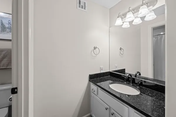 a view of a dinning table and chairs in the patio