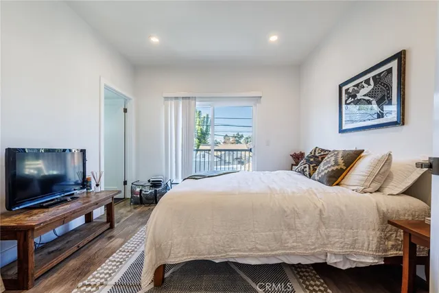 a bed room with a bed and a couch