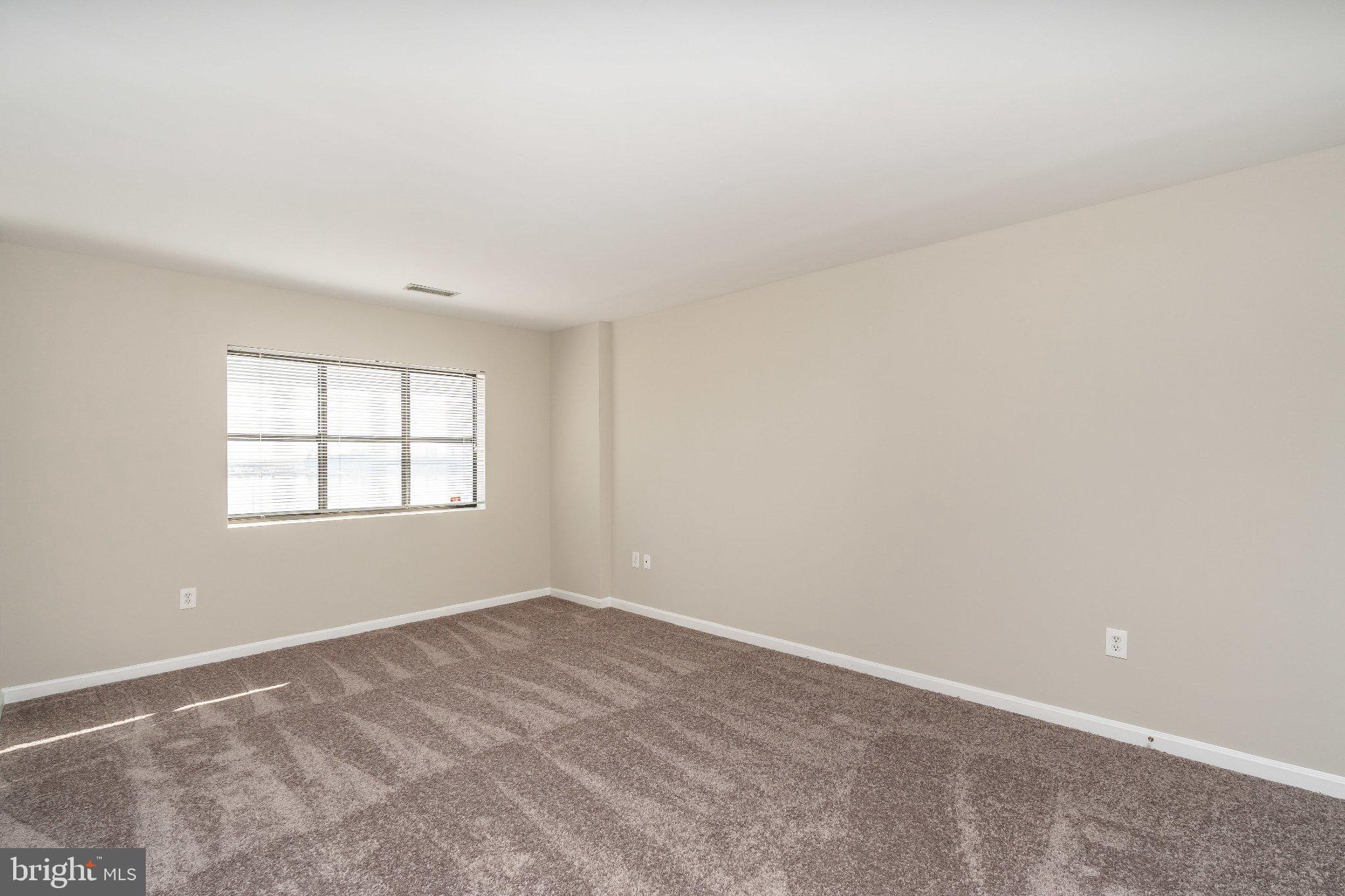 2702 Lighthouse Point East, Unit 532 Baltimore, MD 21224 - Photo 24 of 41 Spacious, sunlit room ready for ideas.