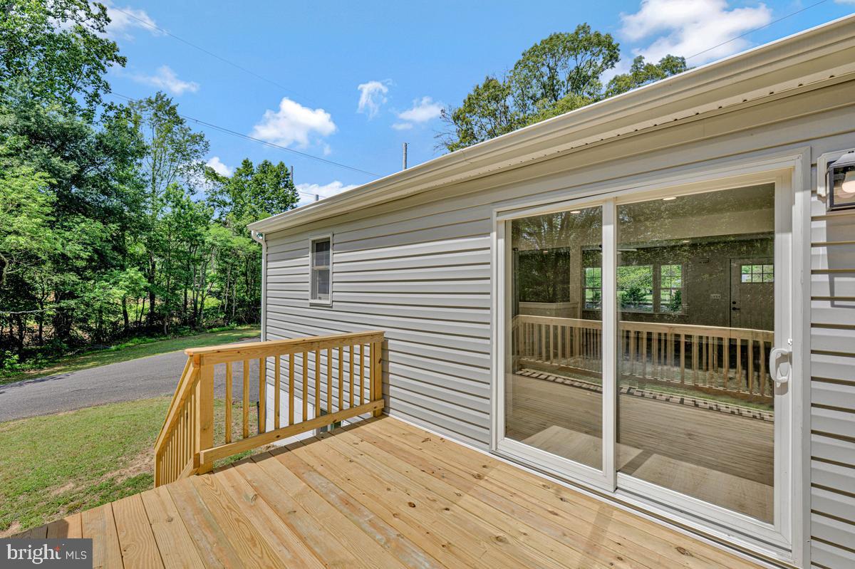 13304 Cherry Tree Crossing Road Brandywine, MD 20613 - Photo 12 of 32 Sunny deck with serene views.