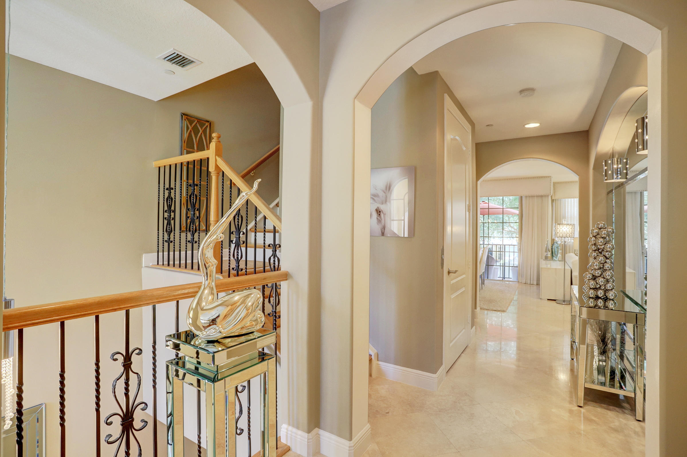 5645 Northeast Trieste Way Boca Raton, FL 33487 - Photo 15 of 51 Vaulted Ceiling up from Foyer