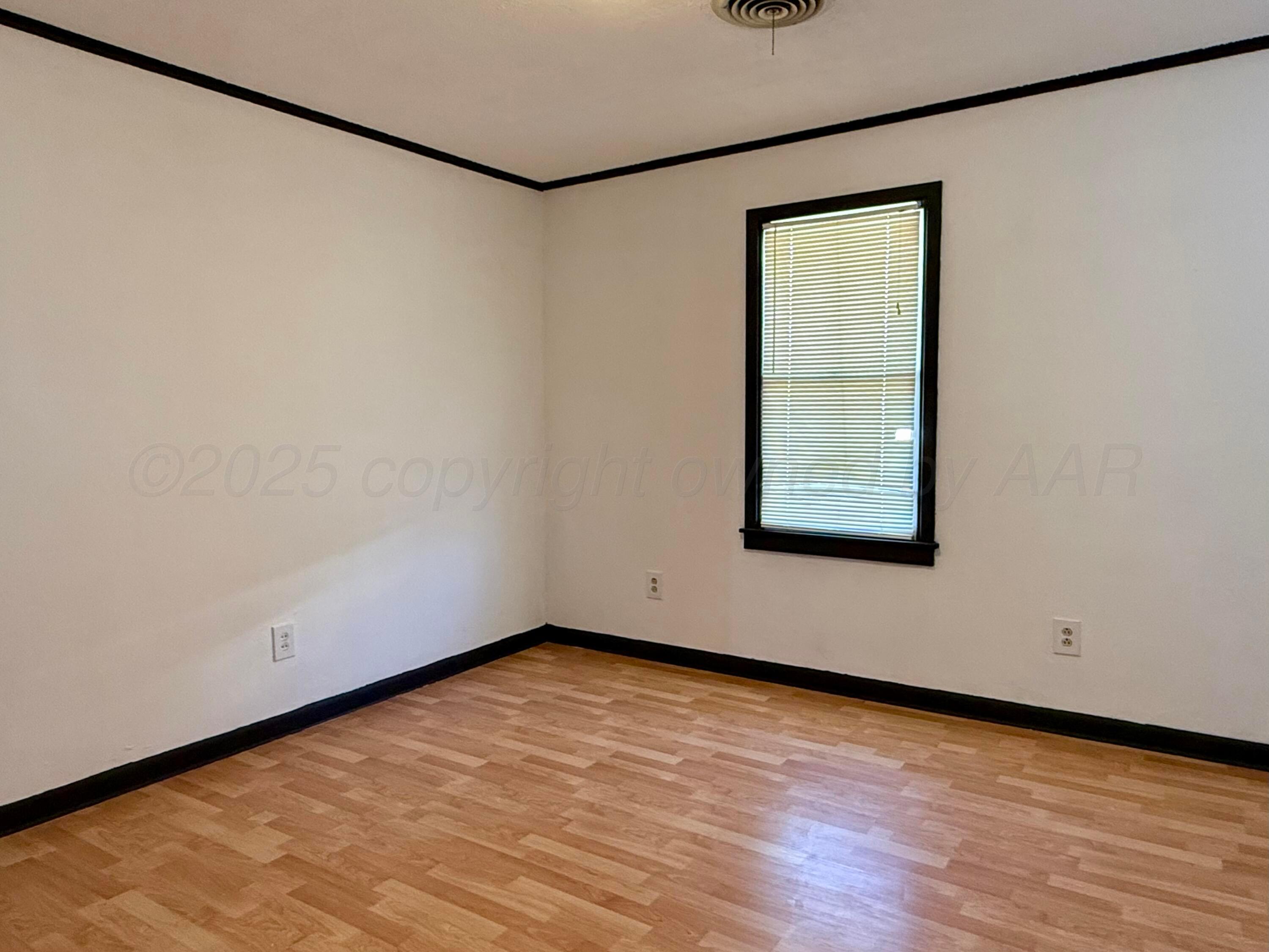 601 Jackson Street Borger, TX 79007 - Photo 13 of 22 Master bedroom