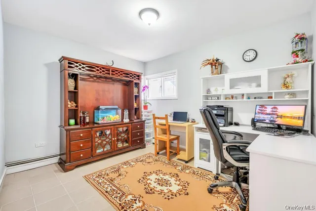 a room with furniture a air conditioner and a window