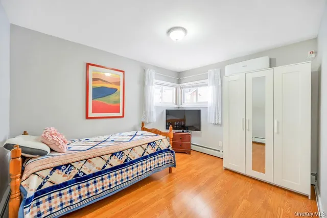 a bedroom with a bed and a window in it