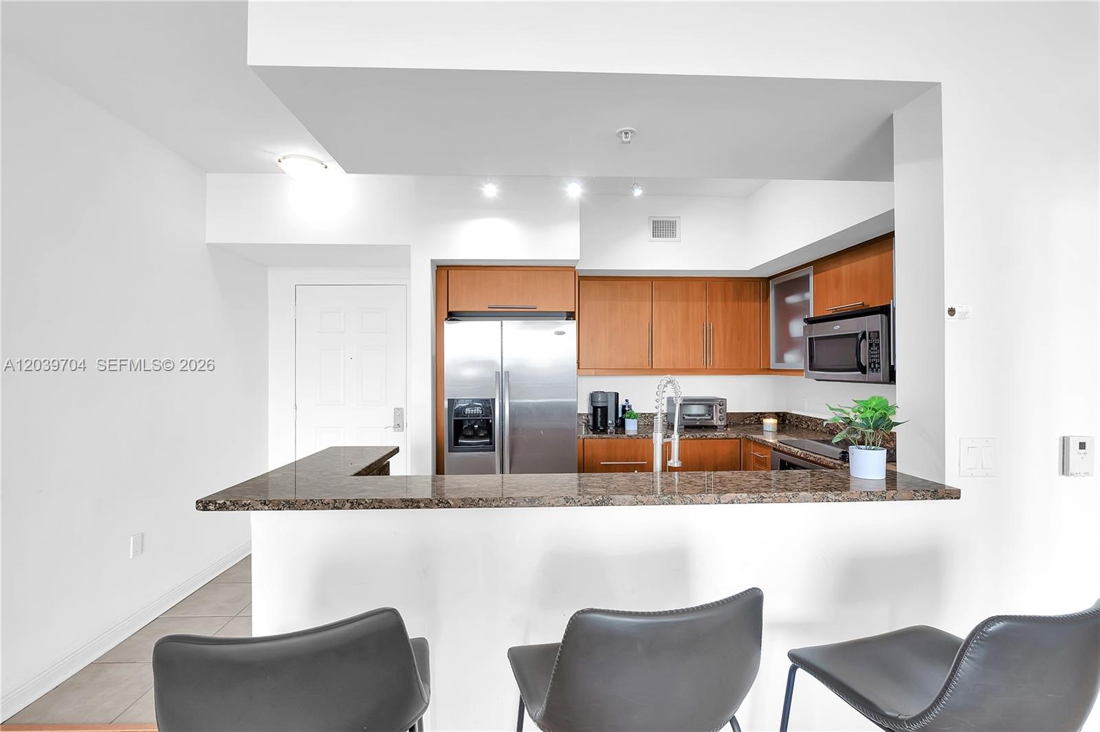 888 Douglas Road, Unit 910 Coral Gables, FL 33134 - Photo 11 of 32 Granite snack bar