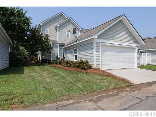 16538 Knox Run Road Huntersville, NC 28078 - Photo 14 of 14 a front view of a house with a garden
