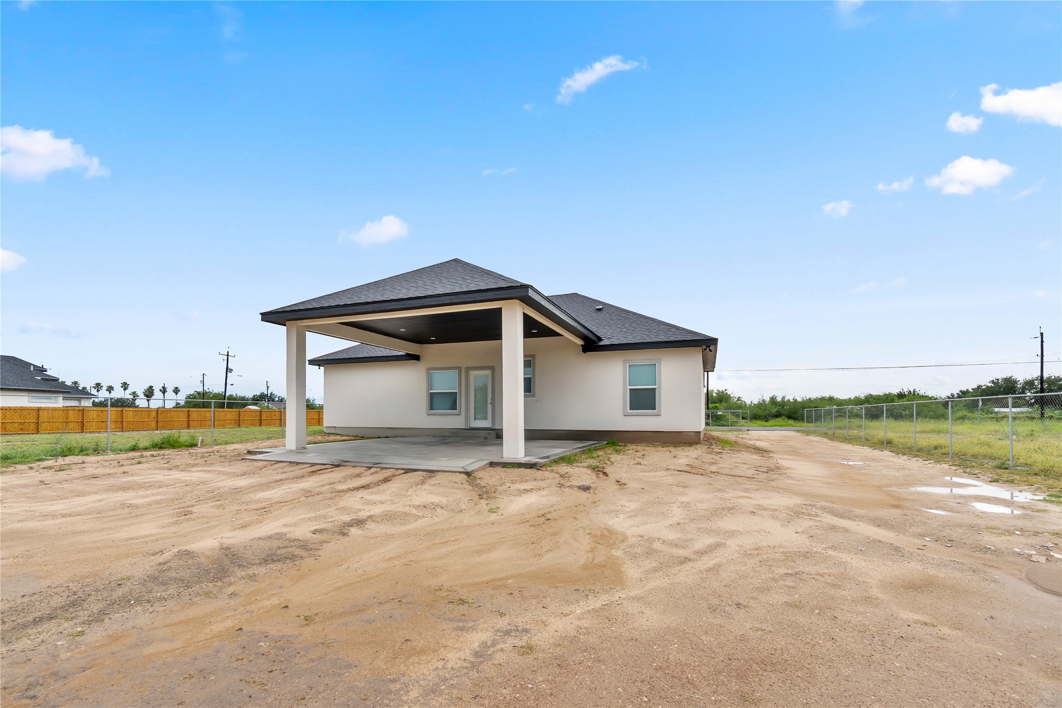 23232 Val Verde Edcouch, TX 78538 - Photo 16 of 19 a view of an house with backyard and lake view