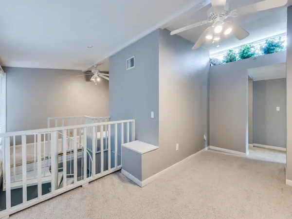 a view of a hallway with entryway