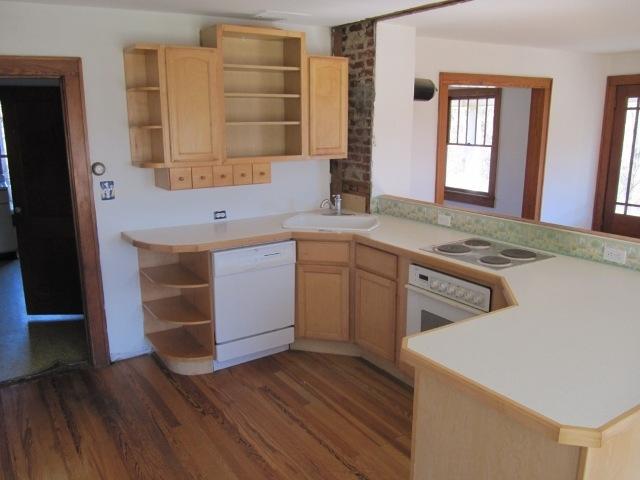 2059 Burkette Road Elliston, VA 24087 - Photo 2 of 18 a kitchen that has a sink and a stove in it