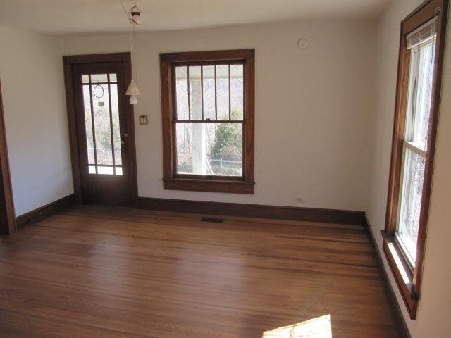 2059 Burkette Road Elliston, VA 24087 - Photo 3 of 18 an empty room with wooden floor and windows