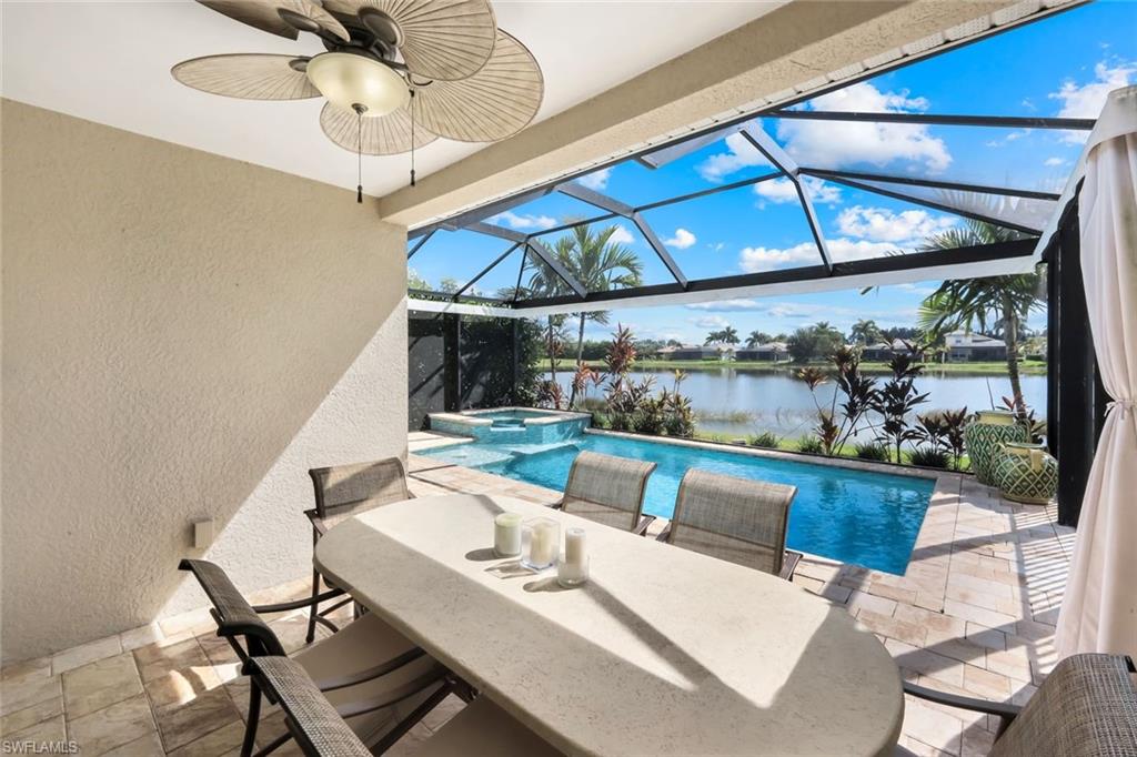 14795 Edgewater Circle Naples, FL 34114 - Photo 21 of 39 a outdoor space with lots of tables and chairs