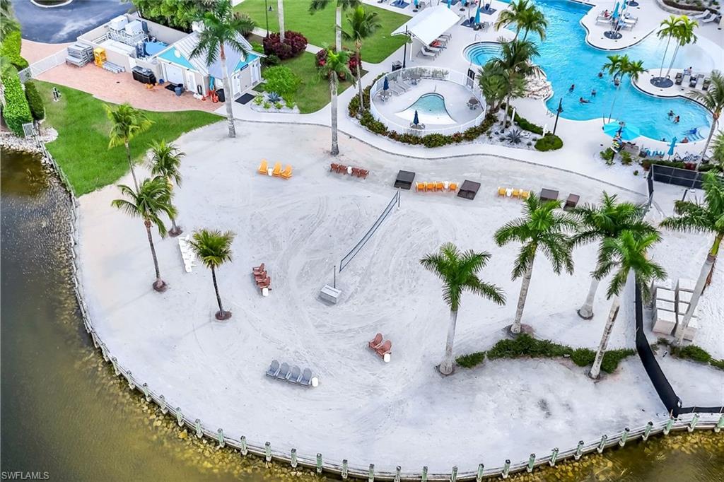 14795 Edgewater Circle Naples, FL 34114 - Photo 36 of 39 an aerial view of a house with a yard and sitting area