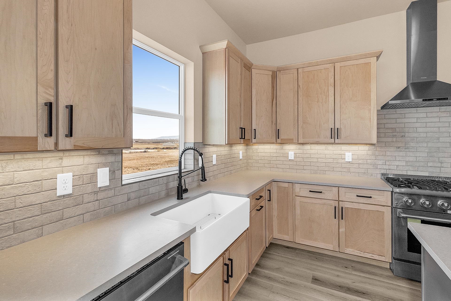 1656 8 Road Mack, CO 81525 - Photo 12 of 28 a kitchen with a sink cabinets and window