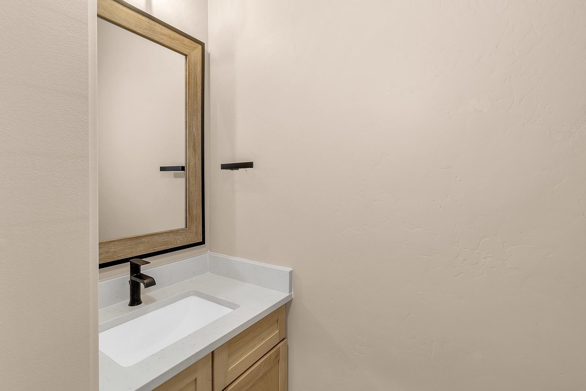 1656 8 Road Mack, CO 81525 - Photo 17 of 28 a bathroom with a sink and a mirror