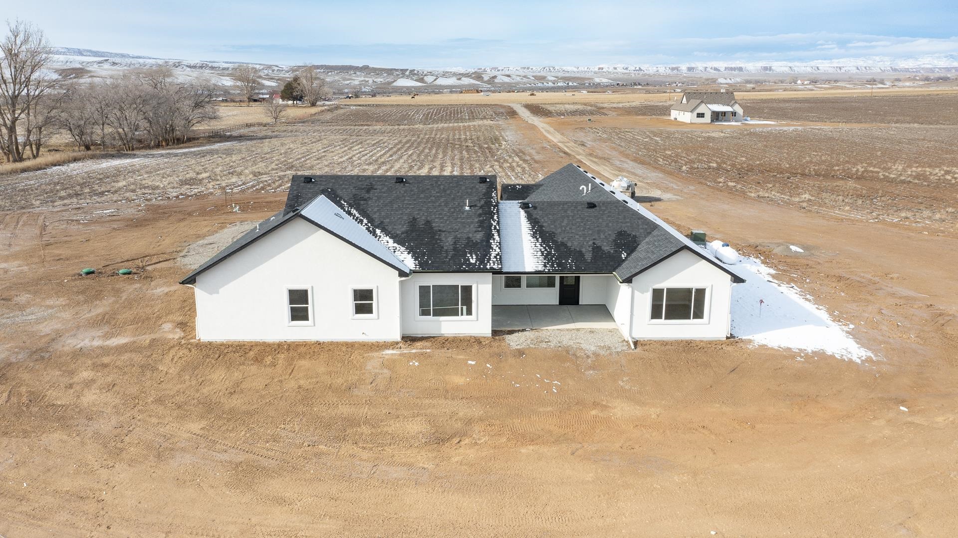 1656 8 Road Mack, CO 81525 - Photo 25 of 28 front view of house with a terrace
