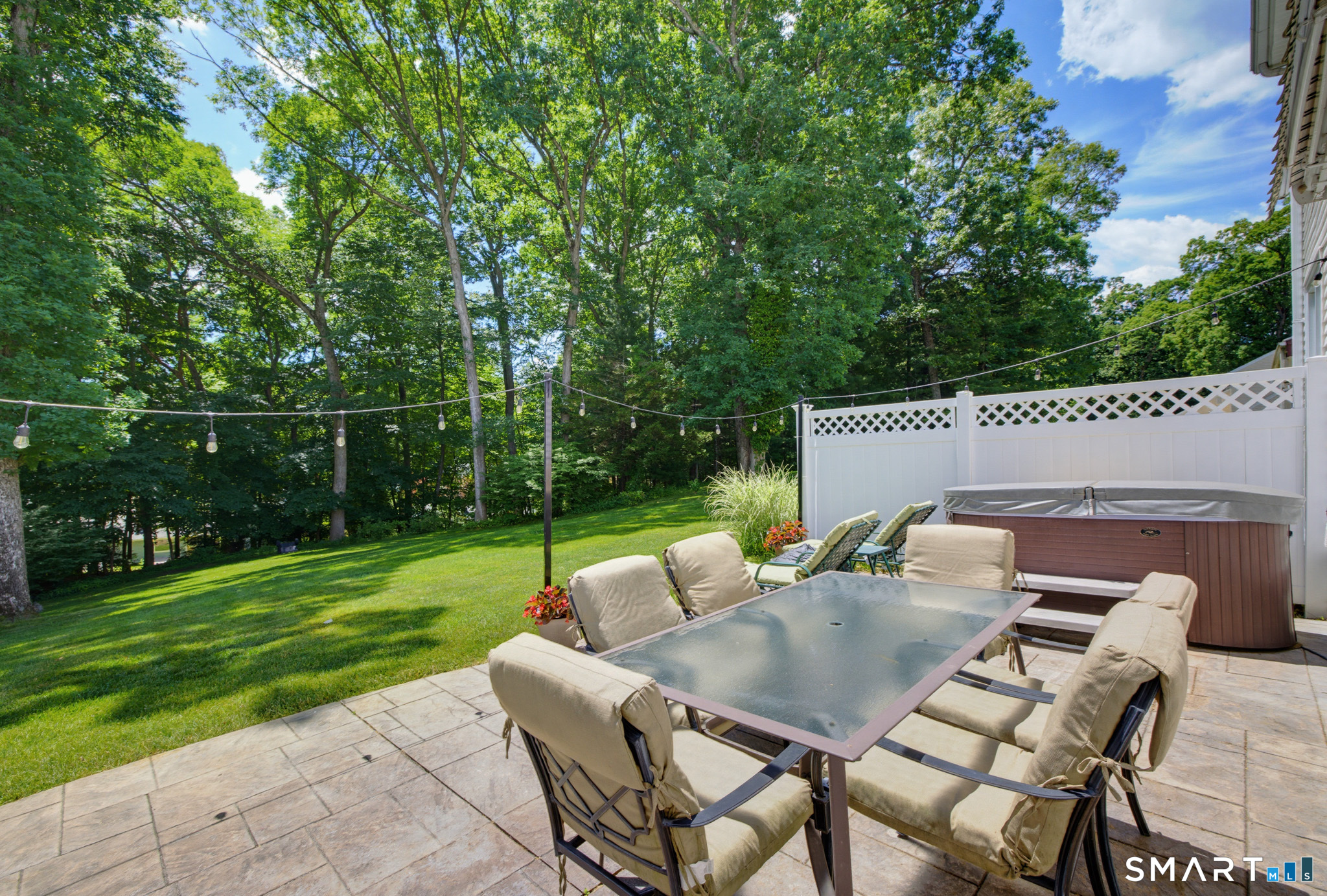 224 Spring Street Manchester, CT 06040 - Photo 33 of 39 a backyard of a house with table and chairs