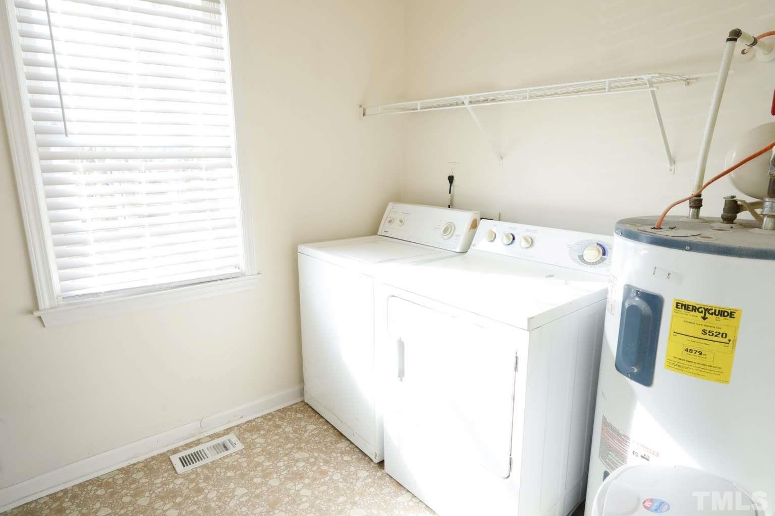 802 South Webb Street Selma, NC 27576 - Photo 11 of 25 a utility room with dryer and washer