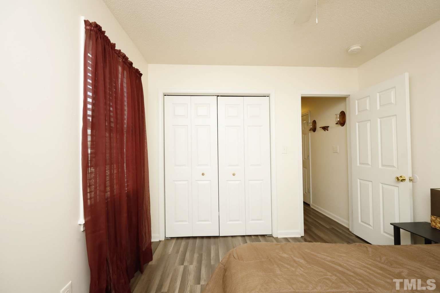 802 South Webb Street Selma, NC 27576 - Photo 14 of 25 a view of hallway with wooden floor