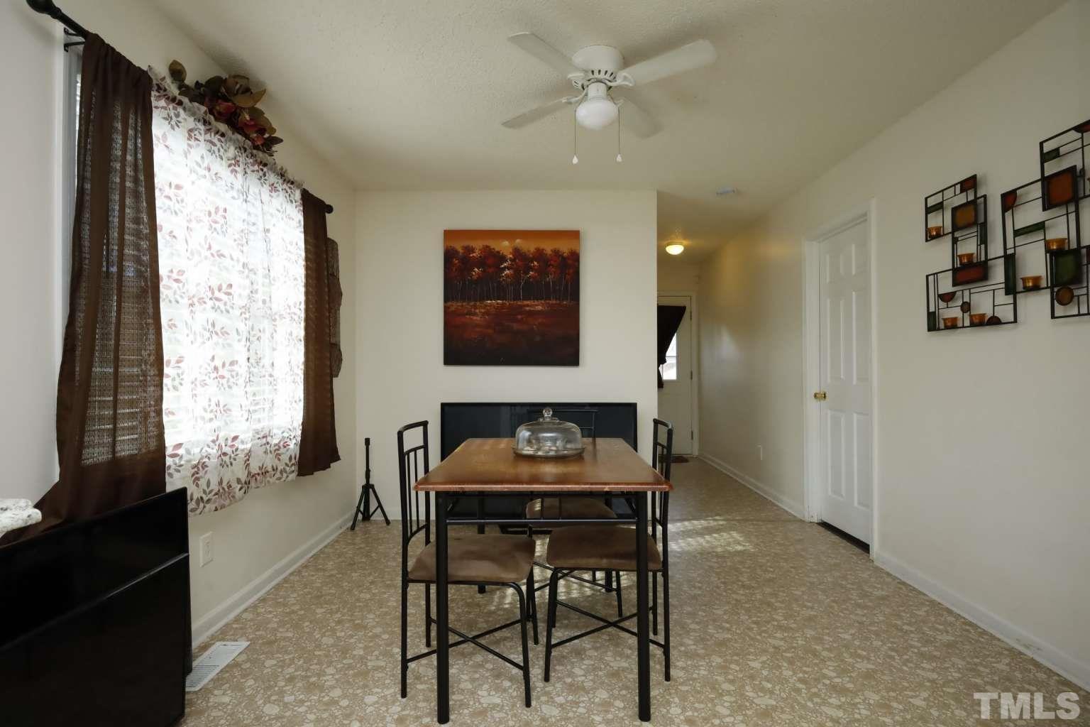 802 South Webb Street Selma, NC 27576 - Photo 10 of 25 a room with furniture and window