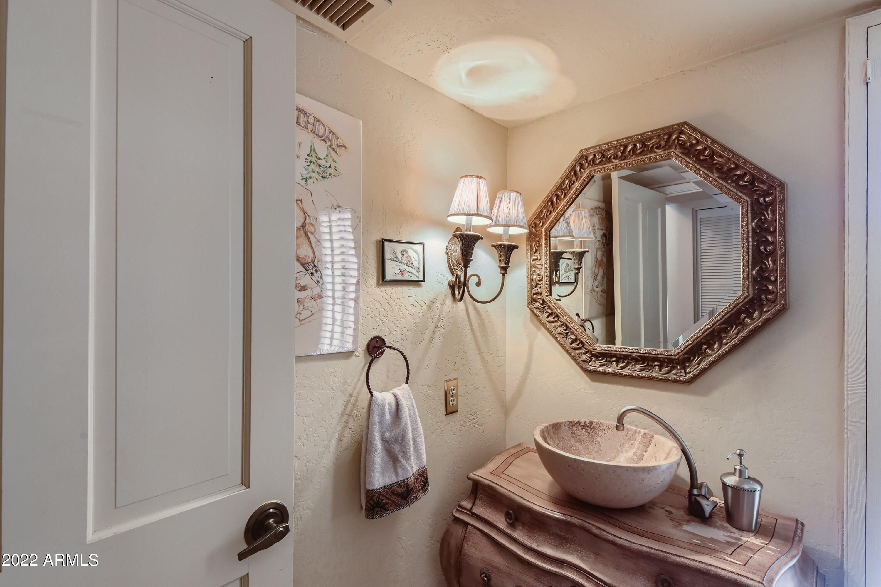 4438 East Camelback Road, Unit 152 Phoenix, AZ 85018 - Photo 14 of 30 Half bath off entry