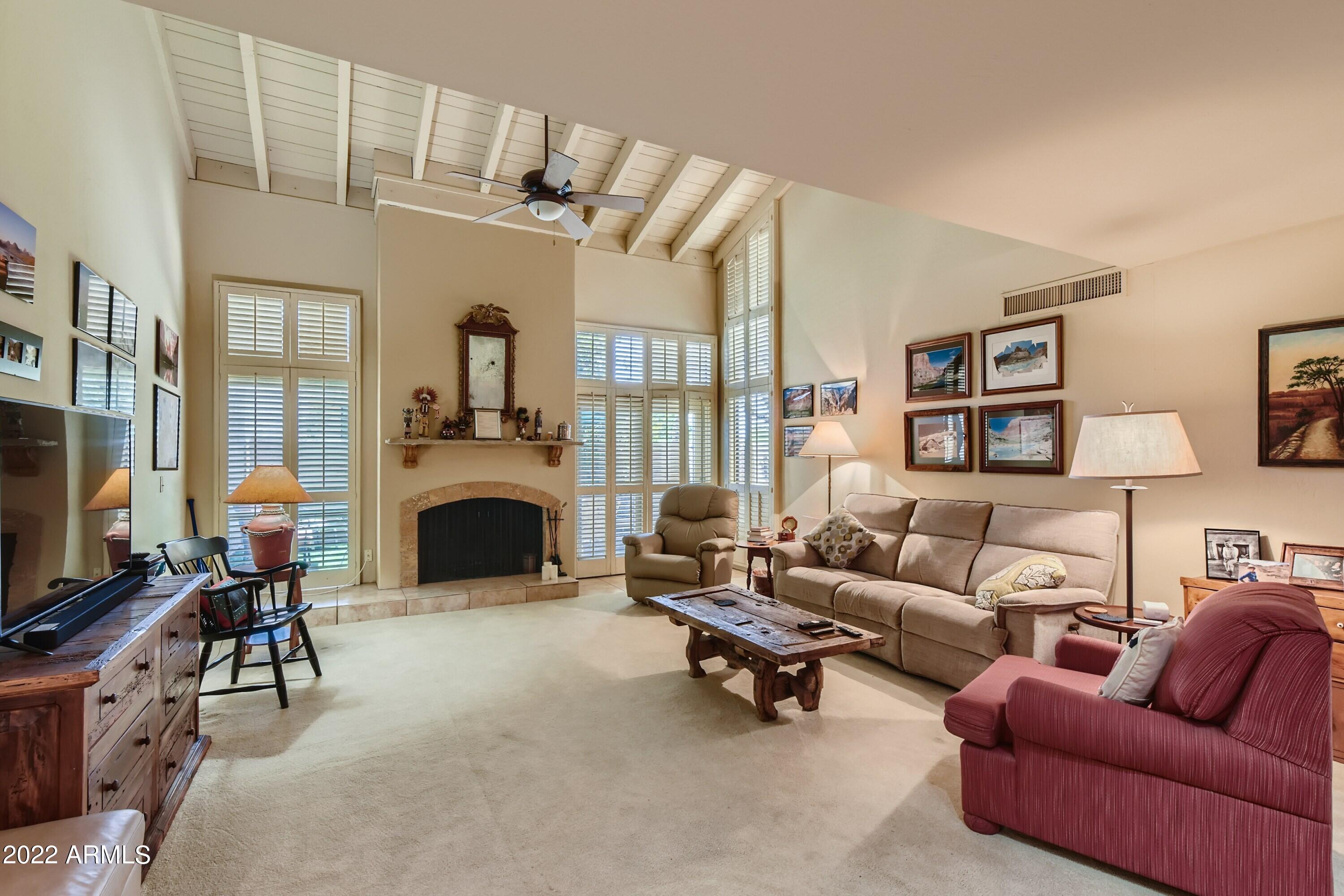 4438 East Camelback Road, Unit 152 Phoenix, AZ 85018 - Photo 6 of 30 Vaulted ceiling in living rm