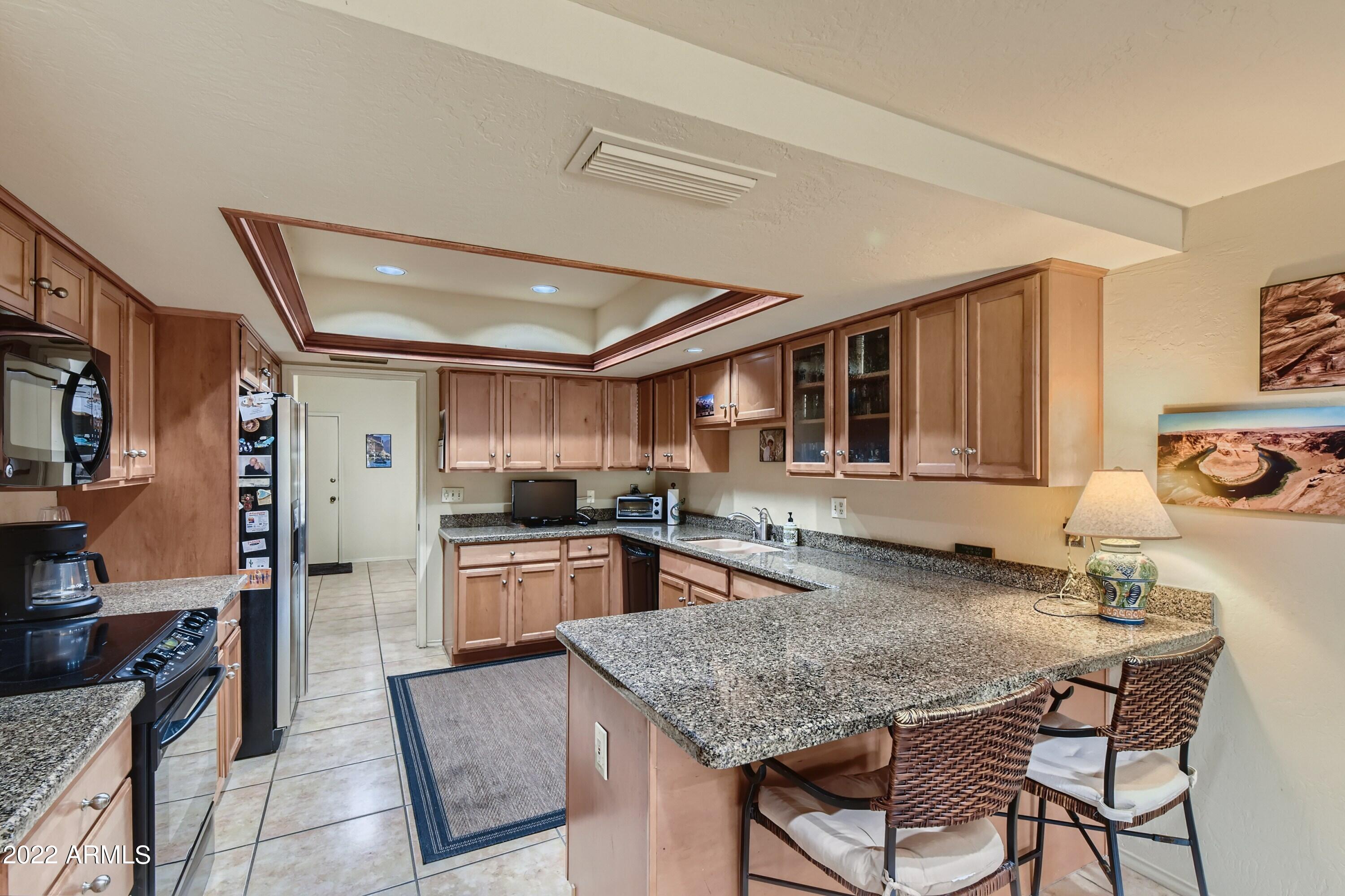 4438 East Camelback Road, Unit 152 Phoenix, AZ 85018 - Photo 9 of 30 Lots of storage & counter space